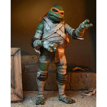 Universal Monsters x Teenage Mutant Ninja Turtles Ultimate Michelangelo as The Mummy 7-Inch Scale Action Figure